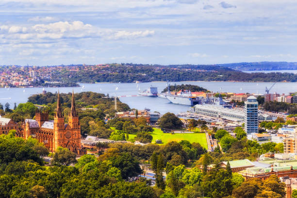 Sydney Goulburn 2 St Mary HMAS Green hyde park and domain downtown suburbs in Sydney city from elevation of high-rise towers to Sydney Harbour shores. hyde park sydney stock pictures, royalty-free photos & images