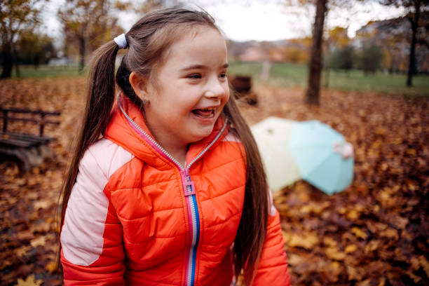 istock Happy girl in the park 1444810031