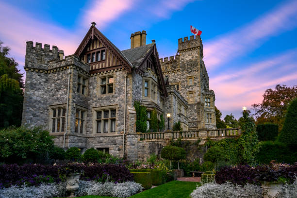 Pink sky at Hatley Castle, Victoria, Vancouver Island, BC Canada Victoria, BC Canada - September 24, 2019: A long exposure at Hatley Castle with a pink sky, Victoria, BC Canada colwood photos stock pictures, royalty-free photos & images