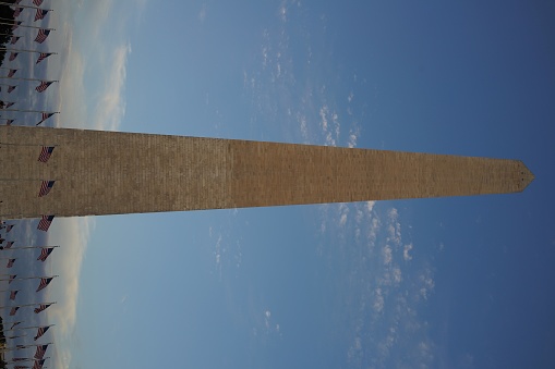 The Washington Monument is an obelisk shaped building within the National Mall in Washington, D.C., built to commemorate George Washington, once commander-in-chief of the Continental Army in the American Revolutionary War and the first President of the United States.u