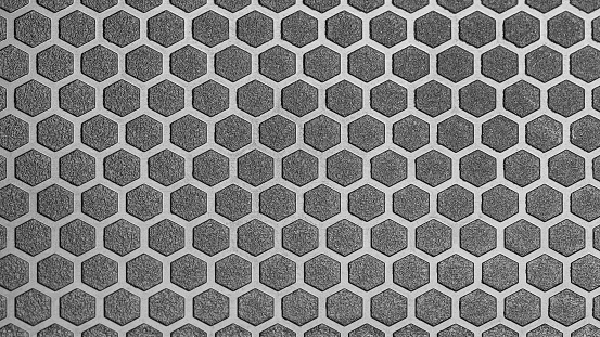 Black plastic honeycomb background. Hexagon pattern. Honeycomb concept.