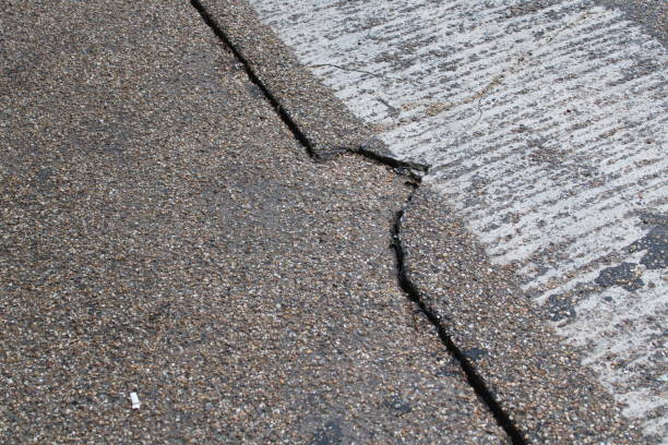 istock Crack on the side of the road 1444827193