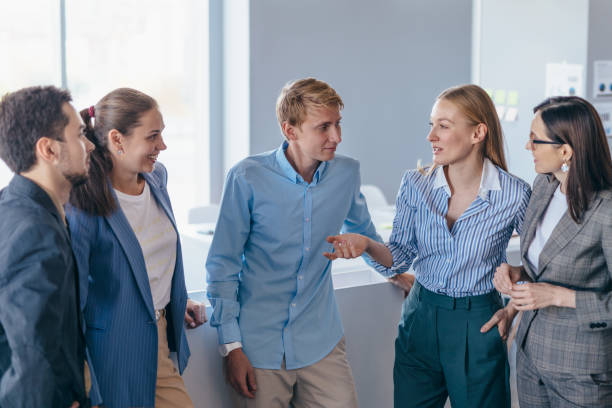 istock Employees chat informally and lively during the break 1444834274