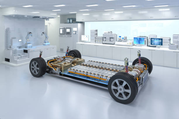 Ev car with pack of battery cells module on platform in laboratory stock photo