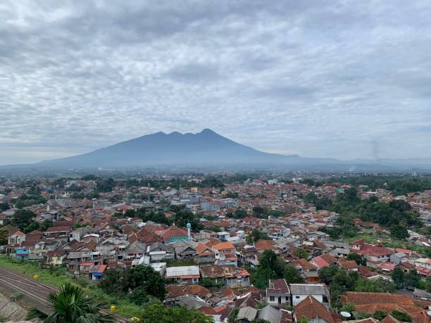 istock Morning view of Mount Gede Pangrango from Bogor City, West Java, Indonesia 1444840912