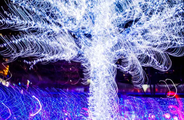 Photo of ILLUMINATED CHRISTMAS TREE : MULTIPLE EXPOSURE