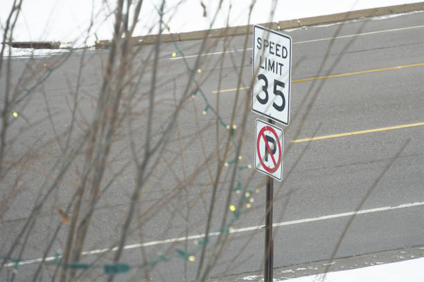 Speed Limit 35 sign and No parking sign