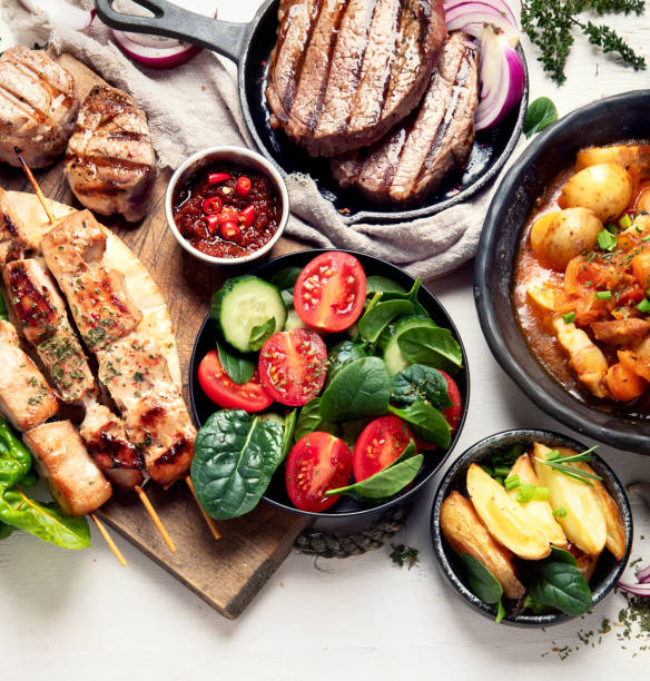 istock Meat dishes. Plates of various meat 1444869032