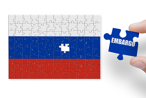 Puzzle made from Russia flag. Sanctions and embargo for Russian war and aggression in Ukraine