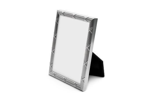 Grey photo  frame on a white background. Copy space.