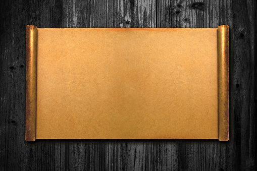 Blank Brown Paper Page Curl on wood background.