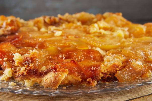 istock Pie baked with apricots on transparent plate 1444888042