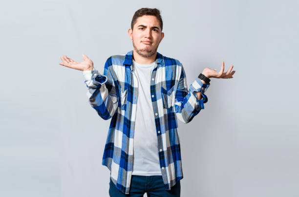 istock Man spreading palms, feeling clueless and uncertain. Person with puzzled gesture spreading hands, Concept of a puzzled man spreading hands isolated. Guy with puzzled gesture spreading palms 1444891671