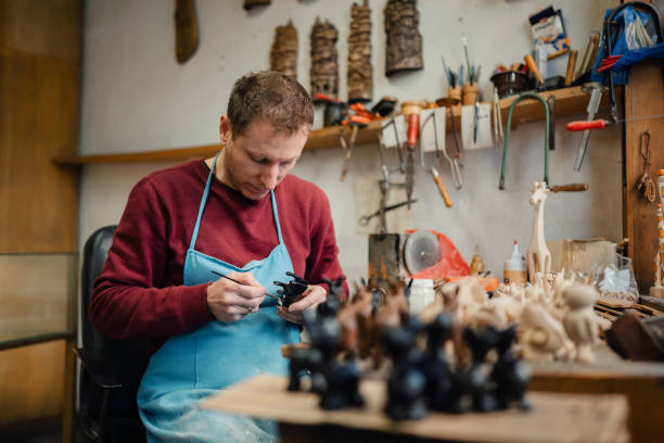 Carpenter working in his creative workshop