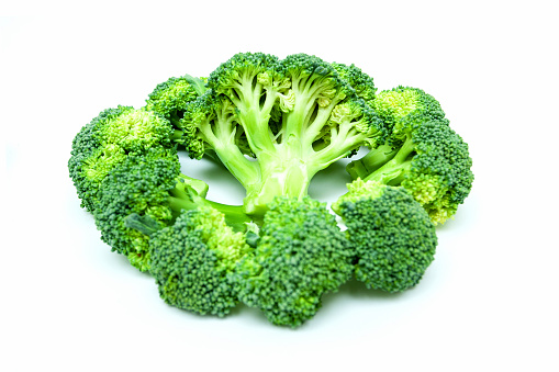 Single fresh broccoli isolated on white background.
