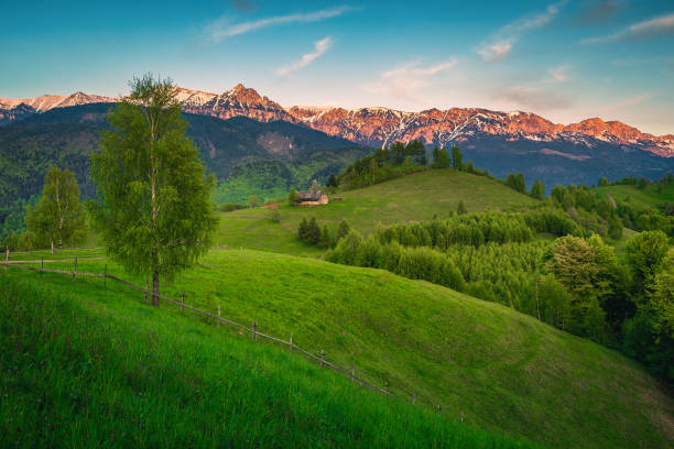istock Stunning spring alpine landscape at sunset, Moieciu de Sus, Romania 1444914123