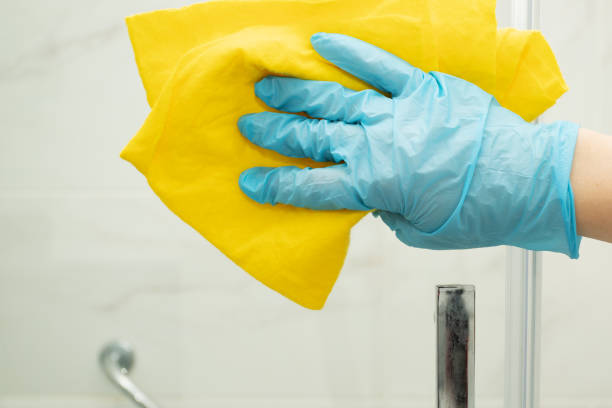 istock hand washes the shower cabin,professional cleaning service 1444914335