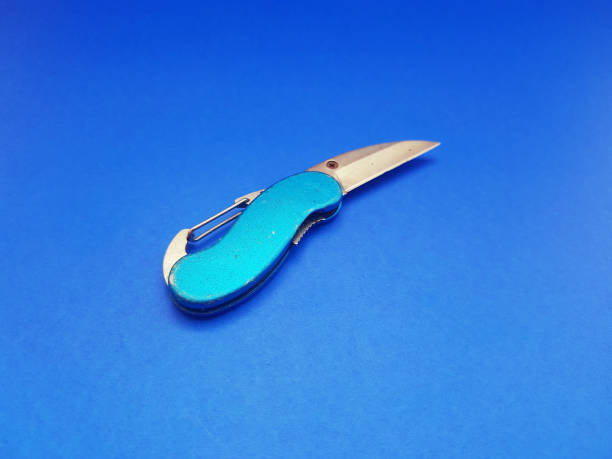 istock An open small penknife with a sky-blue handle that looks like it's starting to break 1444915277