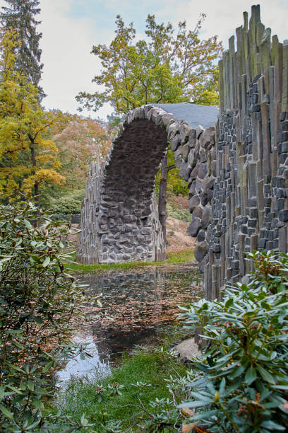 istock Stone arch bridge Kromlau, called Rakotz Bridge, view from the side 1444915397
