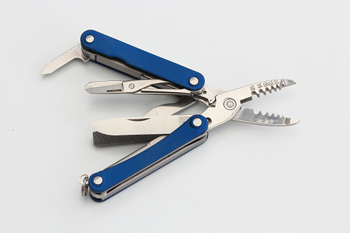 a blue multitool isolated