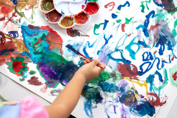 istock Child paint with watercolors. Education concept. 1444926218