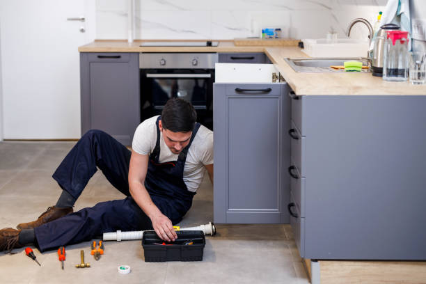 istock A young plumber worker is fixing a drain under a sink. 1444926610