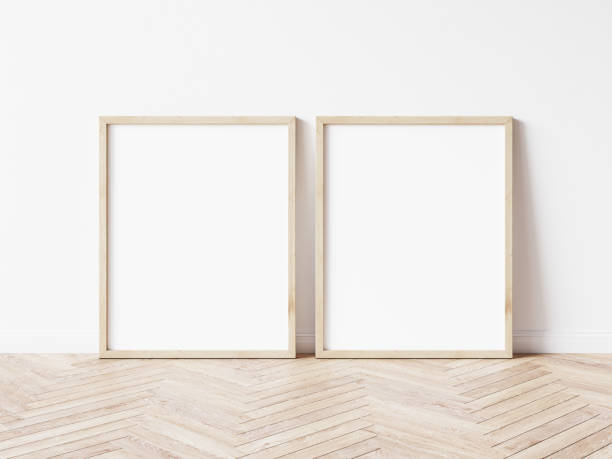 istock Two vertical wooden frame mockup. Two mock up poster on wooden floor. 2 frame 3d illustrations. 1444929419