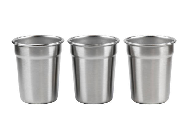 istock Steel shot glasses isolated on white background. 1444932130