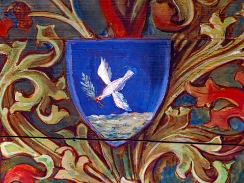 peace dove, detail of a wooden medieval altar in Langenzenn, Germany, franconia