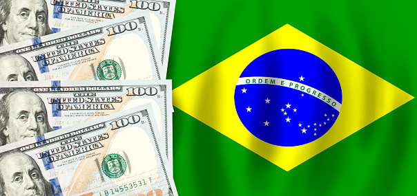 Dollars on flag of Brazil, Brazilian finance, subsidies, social support, GDP concept