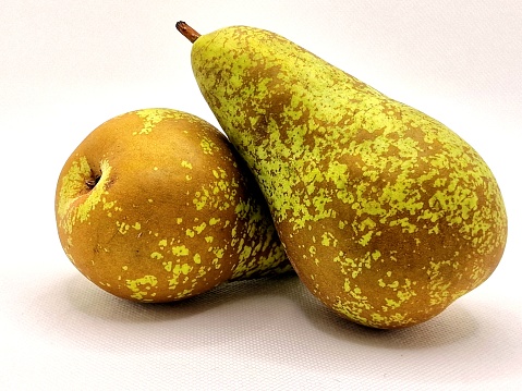 two pears on a white background.  Fresh fruits