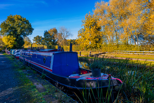 17/Feb/2023 Stratford Canal Nr. Stratford upon Avon England UK. View from the towpath. Autumn. View of narrow boat. No people in picture.