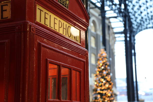 istock Christmas tree decoration red telephone box in London UK 1444938469
