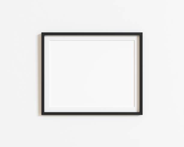 istock Black horizontal frame mockup on white wall. Landscape frame. 3d illustration. 1444941694