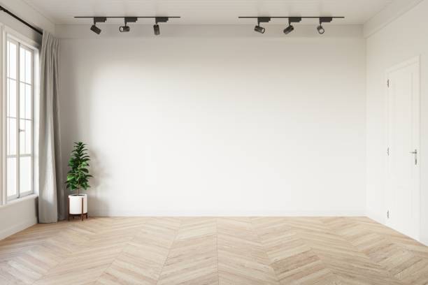 istock Minimal empty room with white wall, light grey curtain and green plant in a white pot on chevron pattern wooden floor. 3d illustration. 1444941745