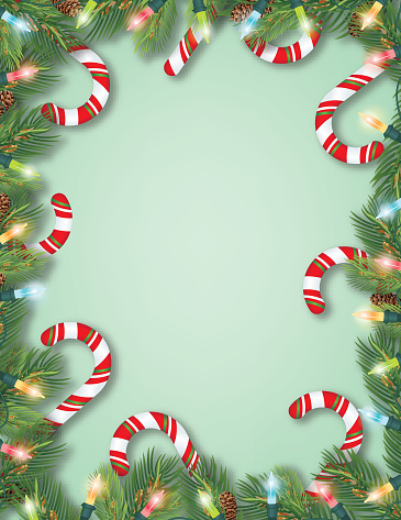 A border element made up of candy canes, Christmas lights, and evergreen branches.