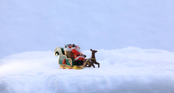 istock toy Santa Claus on a sleigh 1444950012