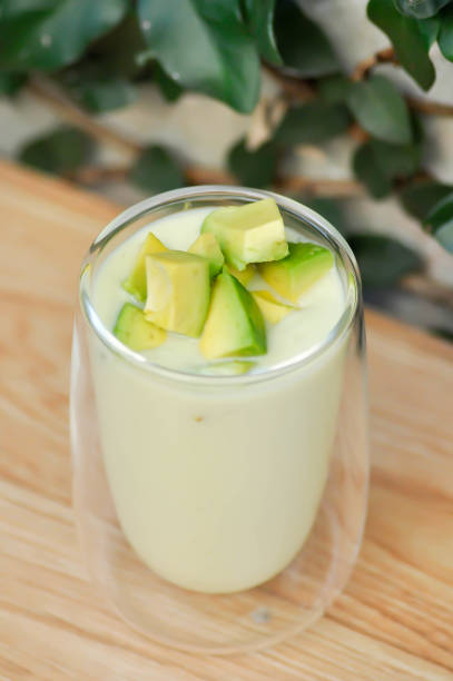 blended avocado , avocado smoothie or avocado  yogurt or avocado milk with avocado topping