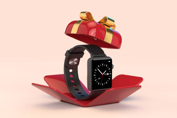 Black Modern Smart Watch with Strap in Opened Red Gift Box with Golden Ribbon. 3d Rendering stock photo