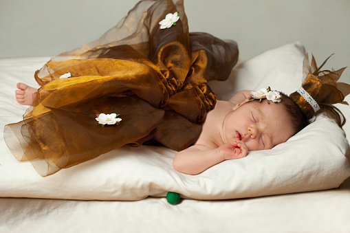Adorable newborn baby girl sleeping