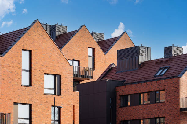 istock Different condominium houses with brick modern architecture 1444959730