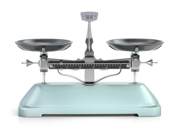 istock Balance scales isolated on white background. 1444962787