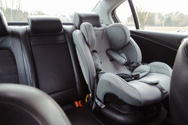 Child car seat for safety in the rear passenger seat of a car Child car seat for safety in the rear passenger seat of a car. empty baby seat stock pictures, royalty-free photos & images