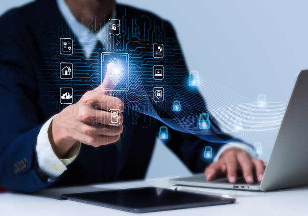 istock In order to gain access to a private system. Biometric fingerprint scanning enables secure network access. On a laptop computer, a person is using finger print authentication technology. 1444963928
