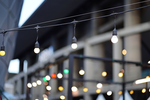 Outdoor Row of illuminated light bulb hanging