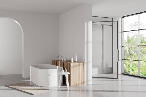 istock Light bathroom interior with tub and douche, panoramic window. Mockup wall 1444966357