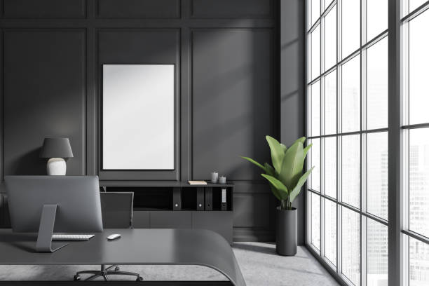 istock Grey office interior desk with computer and panoramic window. Mockup poster 1444966392