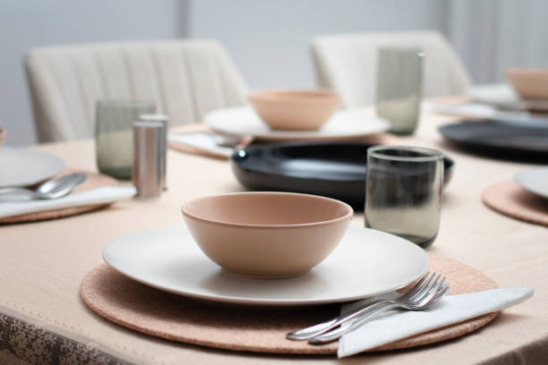 istock plate, spoon and glass arrangement on the dining table 1444967227