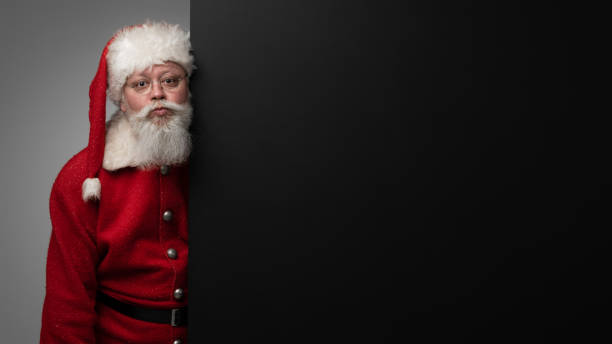 istock Santa Claus with black billboard 1444969905
