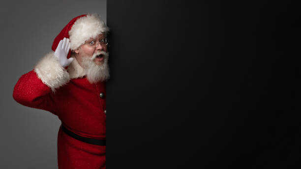istock Santa Claus with black billboard 1444969913